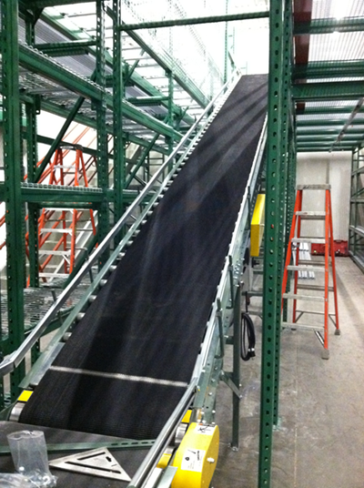 Incline conveyor during installation by Industrial Equipment Erectors